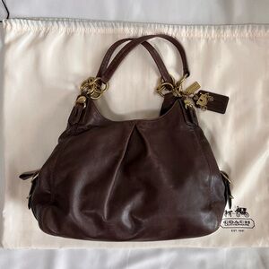 Coach Madison Maggie Purse in brown leather, includes original storage bag.